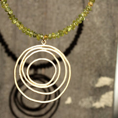 Tequila Sunrise Necklace - 18k Gold Swirl Charm, Green Peridot & 18k Gold Nuggets Necklace.