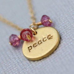 Peace Stamp Necklace - 18k Gold Charm, Pink Topaz & Peridot Necklace.